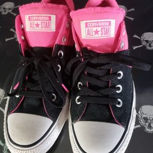 Pink and black converse